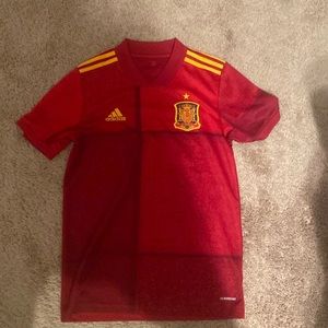 Size small original spain jersey worn a couple of times